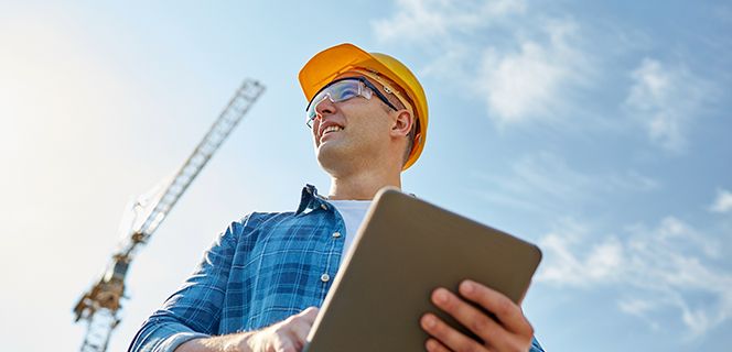 Operator smiling with a tablet